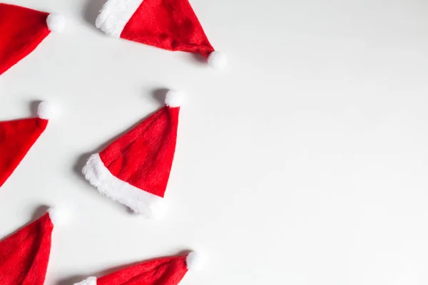 Papai Noel chapéus plana leigos tema de Natal — Fotografia de Stock