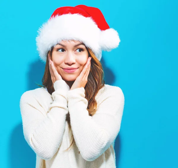 Donna con cappello da Babbo Natale — Foto Stock