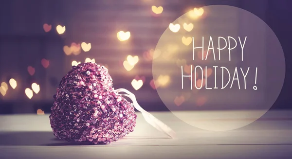 Happy Holiday message with a pink heart — Stock Photo, Image