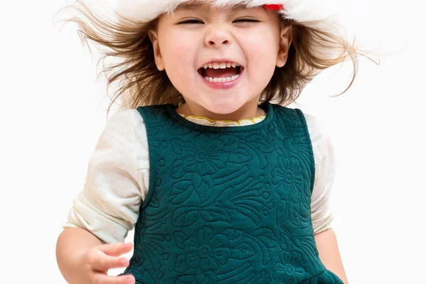 Menina da criança feliz com um chapéu de Papai Noel — Fotografia de Stock