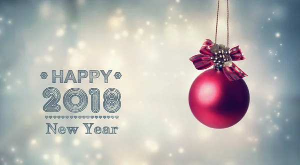 Happy New Year 2018 message with a hanging bauble — Stock Photo, Image