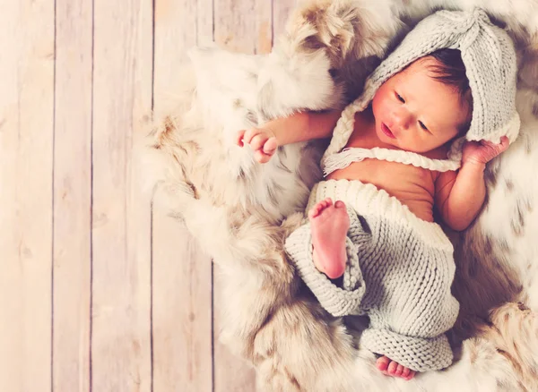 Newborn baby boy in a basket — Stock Photo, Image