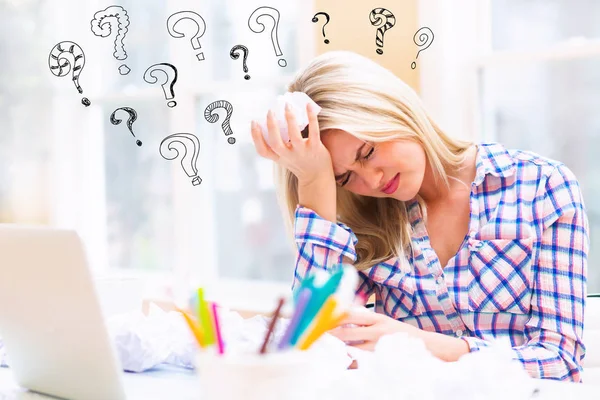 Question Marks with woman with crumpled paper balls — Stock Photo, Image