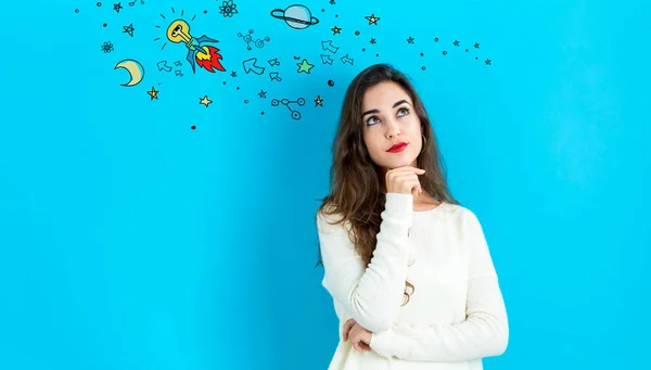 Idea Rocket with young woman — Stock Photo, Image
