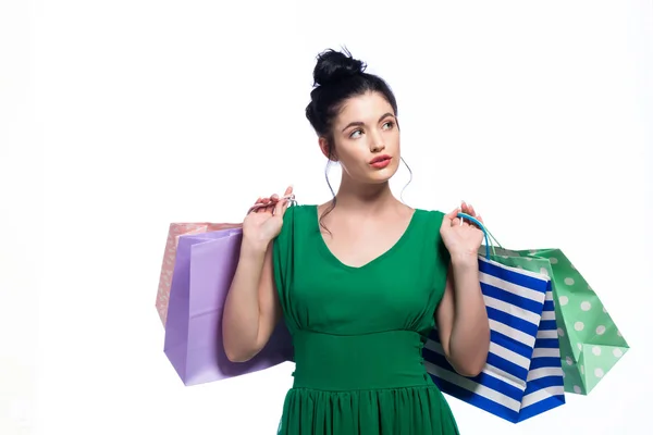 幸せな若い女性を保持ショッピングバッグ — ストック写真