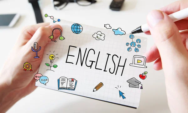 Αγγλικά με επανδρώνει τα χέρια και σημειωματάριο — Φωτογραφία Αρχείου