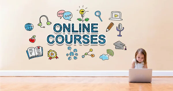 Online Courses text with little girl using a laptop computer — Stock Photo, Image