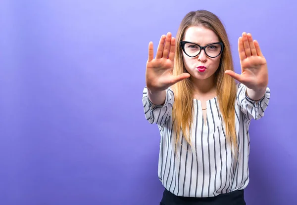 Young woman making a rejection pose — Stock Photo, Image