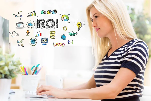 ROI with happy young woman in front of the computer — Stock Photo, Image