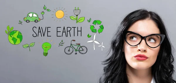 Save Earth with young businesswoman — Stock Photo, Image