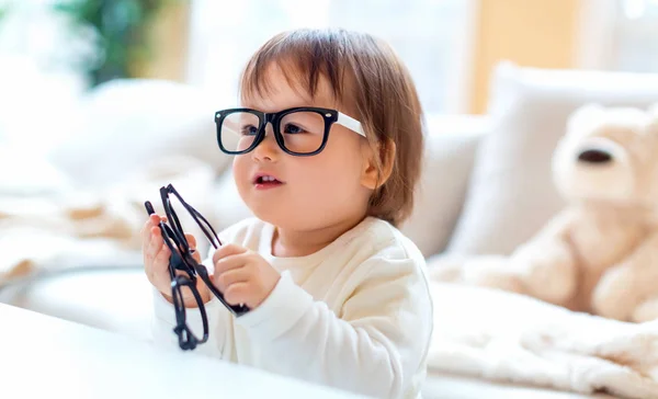 One year old toddler boy with eyeglasses — Stock Photo, Image