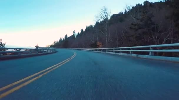 POV driving shot through the mountains in fall — Stock Video