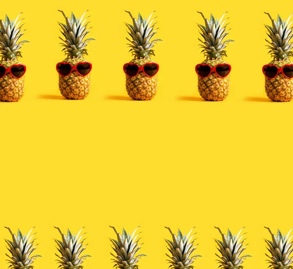 Series of pineapples wearing sunglasses — Stock Photo, Image