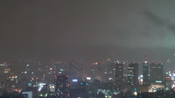 Tempo-lapso de chuva sobre Osaka à noite — Vídeo de Stock