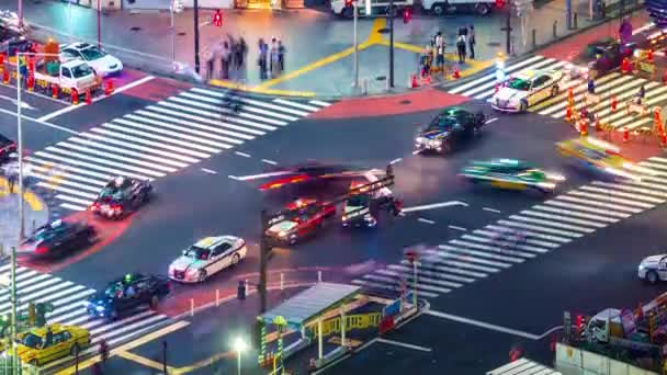 Gyorsított, egy forgalmas útkereszteződés, Shibuya, Tokió — Stock videók