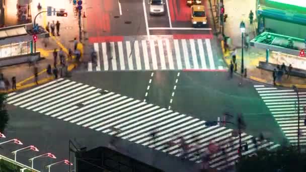 Time-lapse av korsningen berömda scramble i Shibuya, Tokyo — Stockvideo