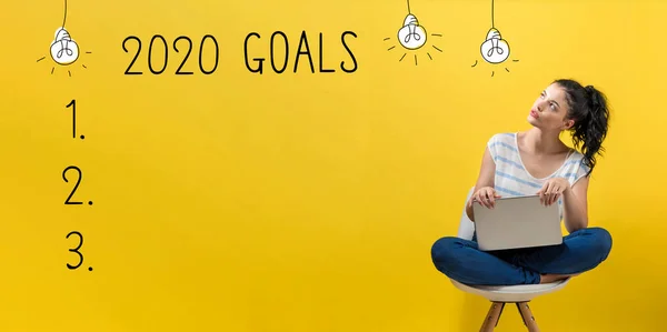 2020 goals with woman using a laptop — Stok fotoğraf