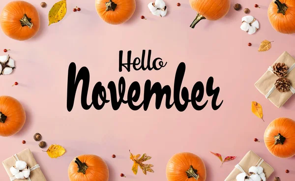 Hello November message with autumn pumpkins with present boxes — Stock Photo, Image