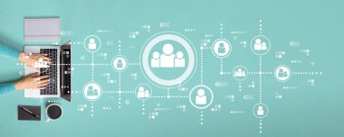 Social connections theme with person using laptop
