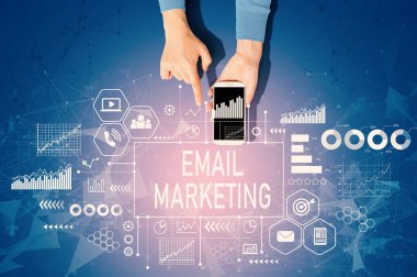 Email marketing concept with person using a smartphone