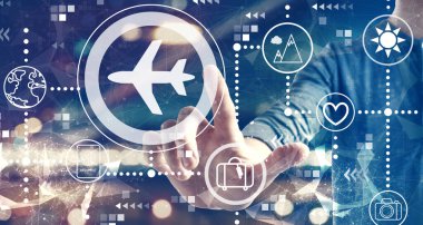 Şehir arka planında bir adamla uçak yolculuğu teması