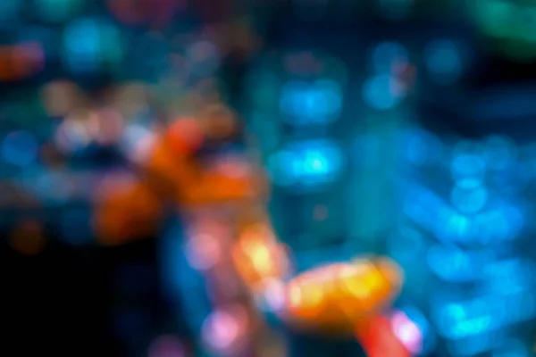 Abstrakt suddig natt stadsbild bokeh ljus bakgrund — Stockfoto