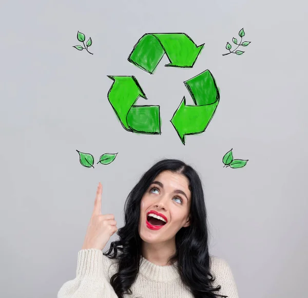 Recycle with happy young woman — Stockfoto