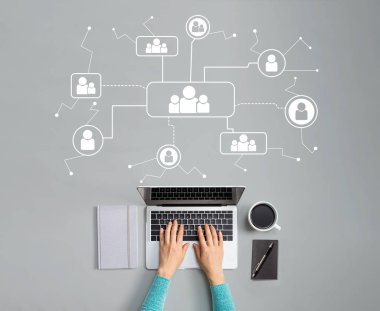 Social connections theme with person using laptop