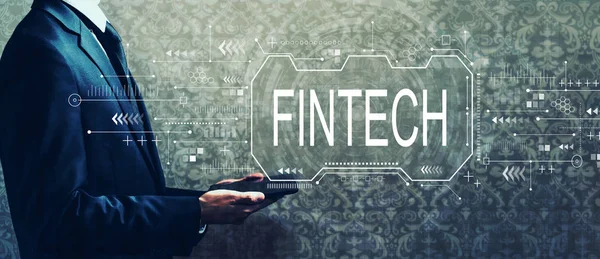 Concepto de Fintech con un empresario sosteniendo una tableta — Foto de Stock