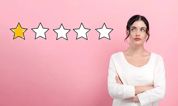 One star rating with young woman — Stock Photo, Image