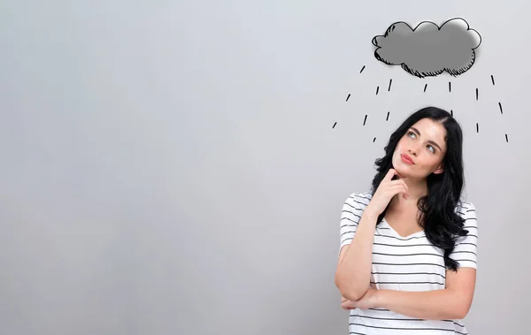 Nube de lluvia con mujer joven — Foto de Stock