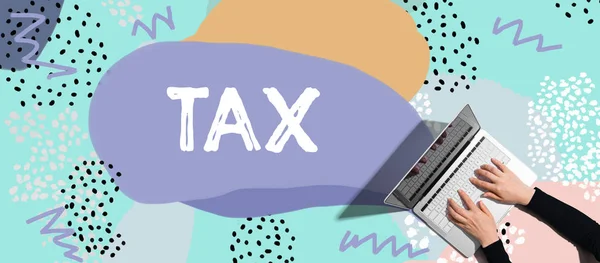 Tax with person using laptop — 스톡 사진