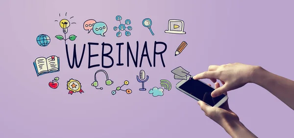 Webinar with person holding smartphone — 스톡 사진