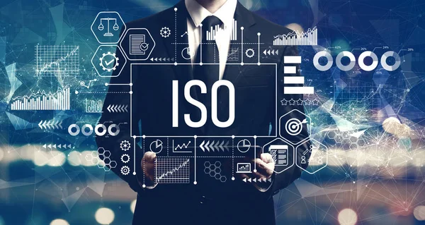 ISO concept with businessman holding a tablet — Stock Photo, Image
