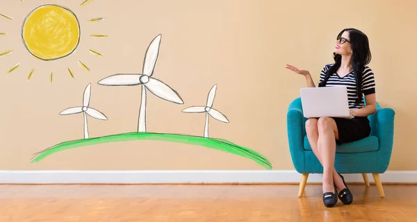 Moinhos de vento tema com mulher usando um laptop — Fotografia de Stock
