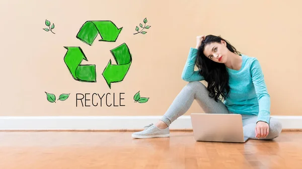 Recycle with woman using a laptop