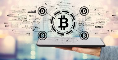 Tablet bilgisayarlı bitcoin temasıName