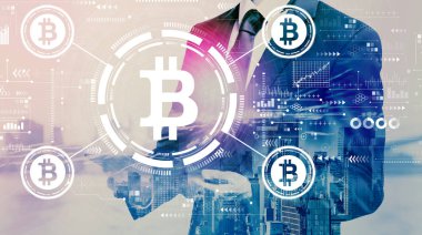 Bitcoin temalı ve elinde tablet olan bir işadamı