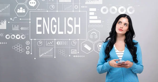 English concept with woman holding a smartphone — Stockfoto