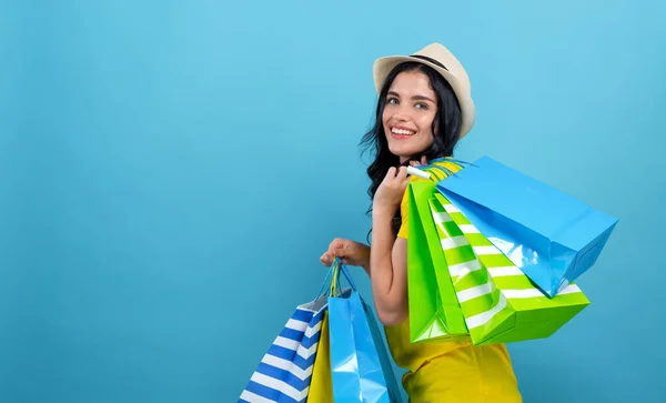 Frau mit vielen Einkaufstüten — Stockfoto