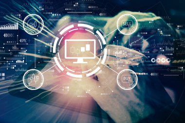 Stock trading theme with man using tablet