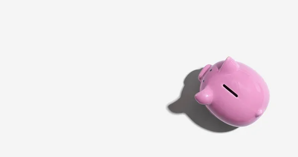 Pink piggy bank overhead view — Zdjęcie stockowe