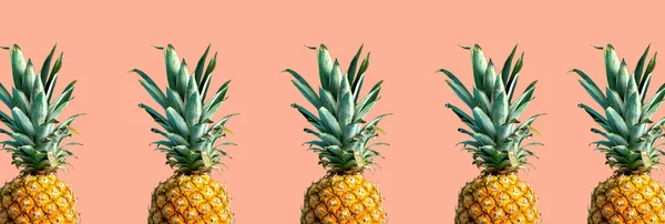 Pineapples on a solid color background — Stock Photo, Image