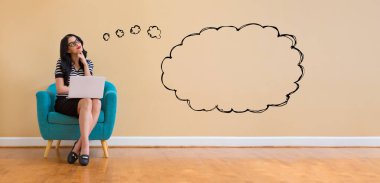 Blank speech bubble with woman using a laptop
