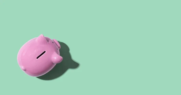 Pink piggy bank overhead view — Stok fotoğraf