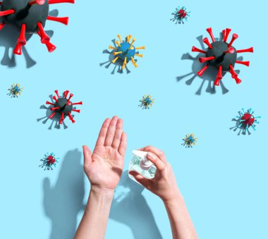 Salgın gribi olan dezenfektan jeli uygulanıyor.