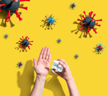 Salgın gribi olan dezenfektan jeli uygulanıyor.