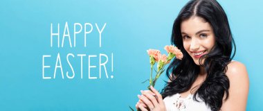 Karanfil tutan genç bayanla Mutlu Paskalyalar