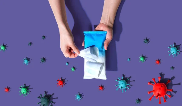 Sanitizer wipe with coronavirus concept — Stock Photo, Image