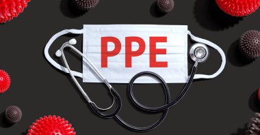 Maske ve steteskoplu PPE temasıName